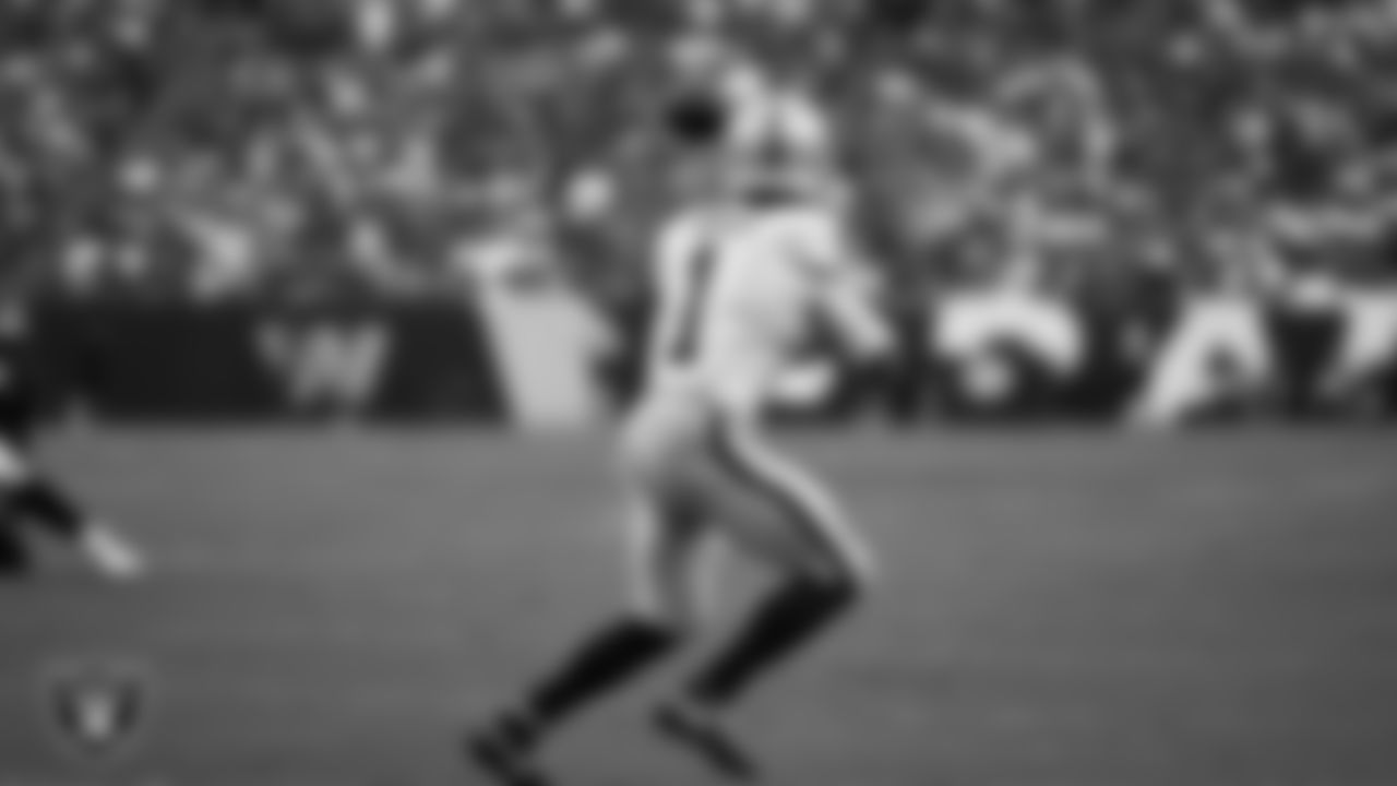 Las Vegas Raiders wide receiver Tre Tucker (1) goes for a 10-yard touchdown catch during the regular season away game against the Washington Commanders at Northwest Stadium.