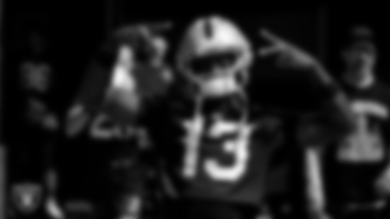 Las Vegas Raiders wide receiver Phillip Dorsett II (13) walks out to the field for practice at Intermountain Health Performance Center.