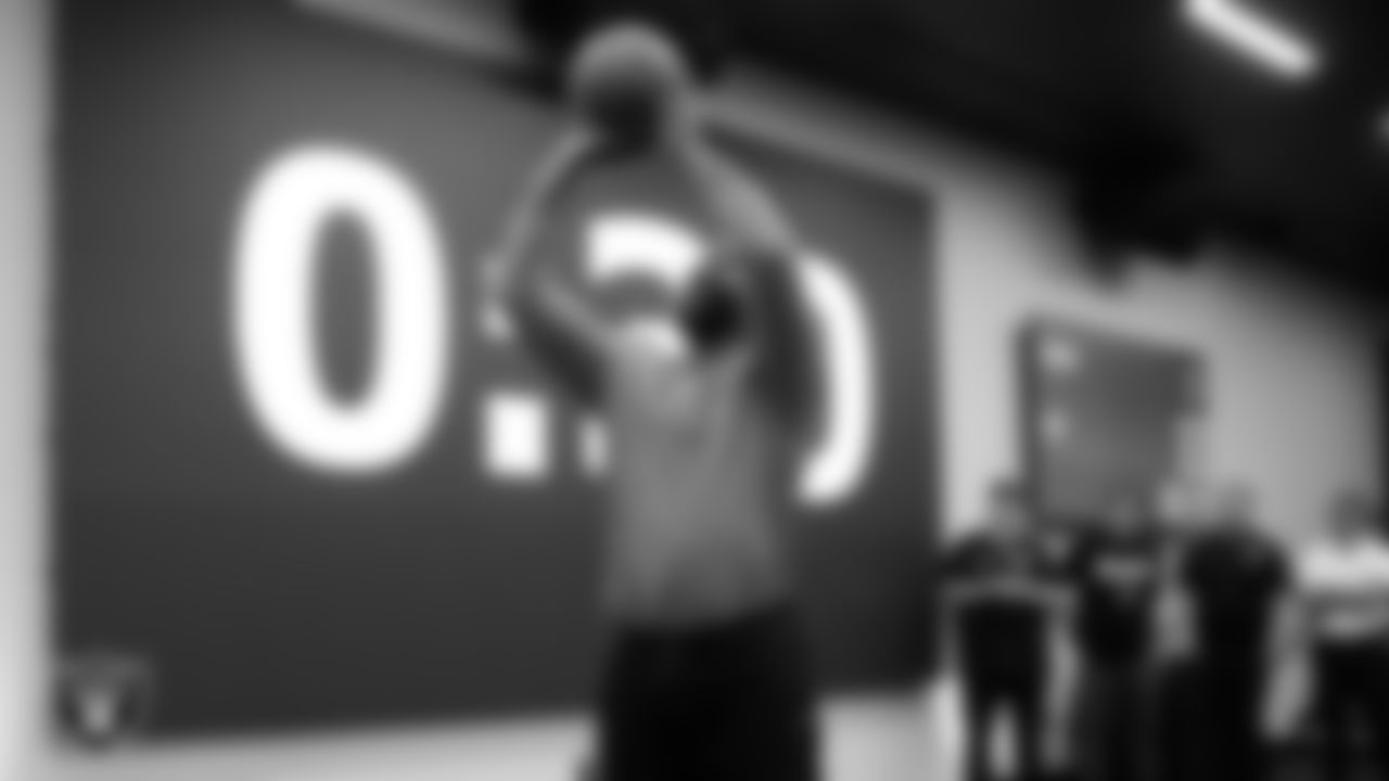 Las Vegas Raiders TV host Baron Davis takes part in a free throw contest during the State of the Team at Intermountain Health Performance Center.
