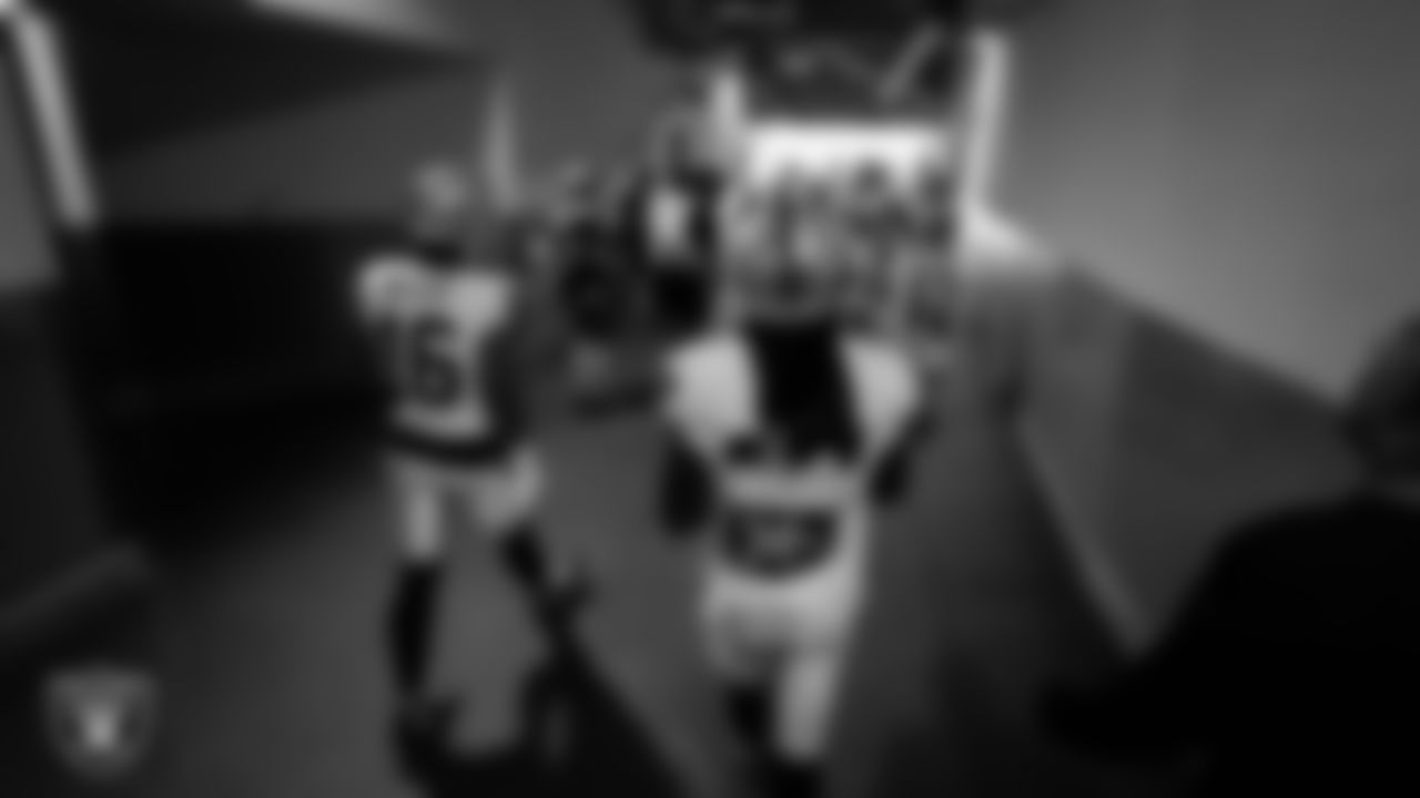 The Las Vegas Raiders walk down the tunnel before the regular season away game against the Los Angeles Chargers at SoFi Stadium.