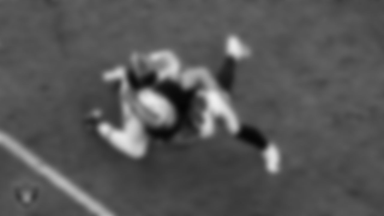 Las Vegas Raiders tight end Michael Mayer (87) runs after making a catch during the regular season home game against the Tennessee Titans at Allegiant Stadium.