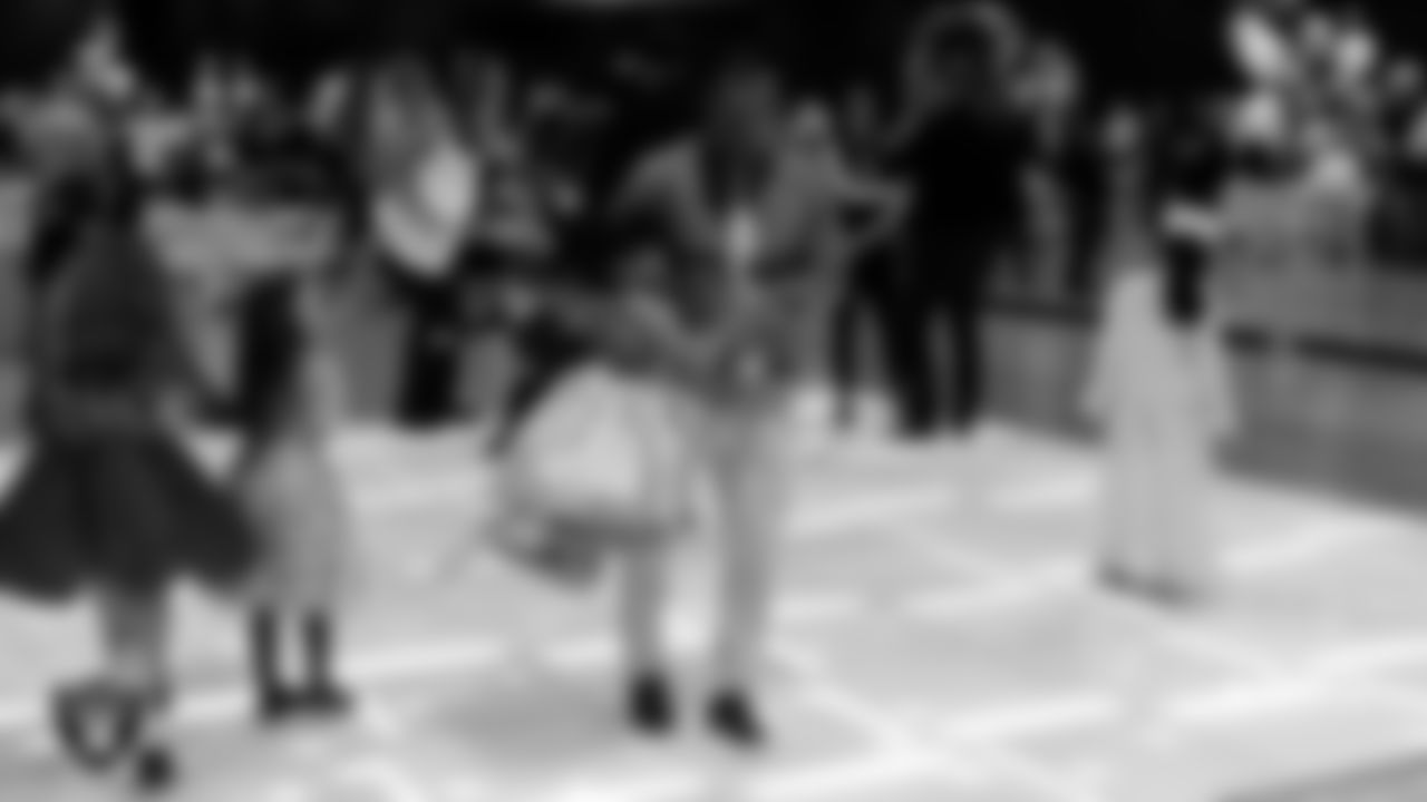 Attendees dance during the Valentine's Day Dance at The Studio.