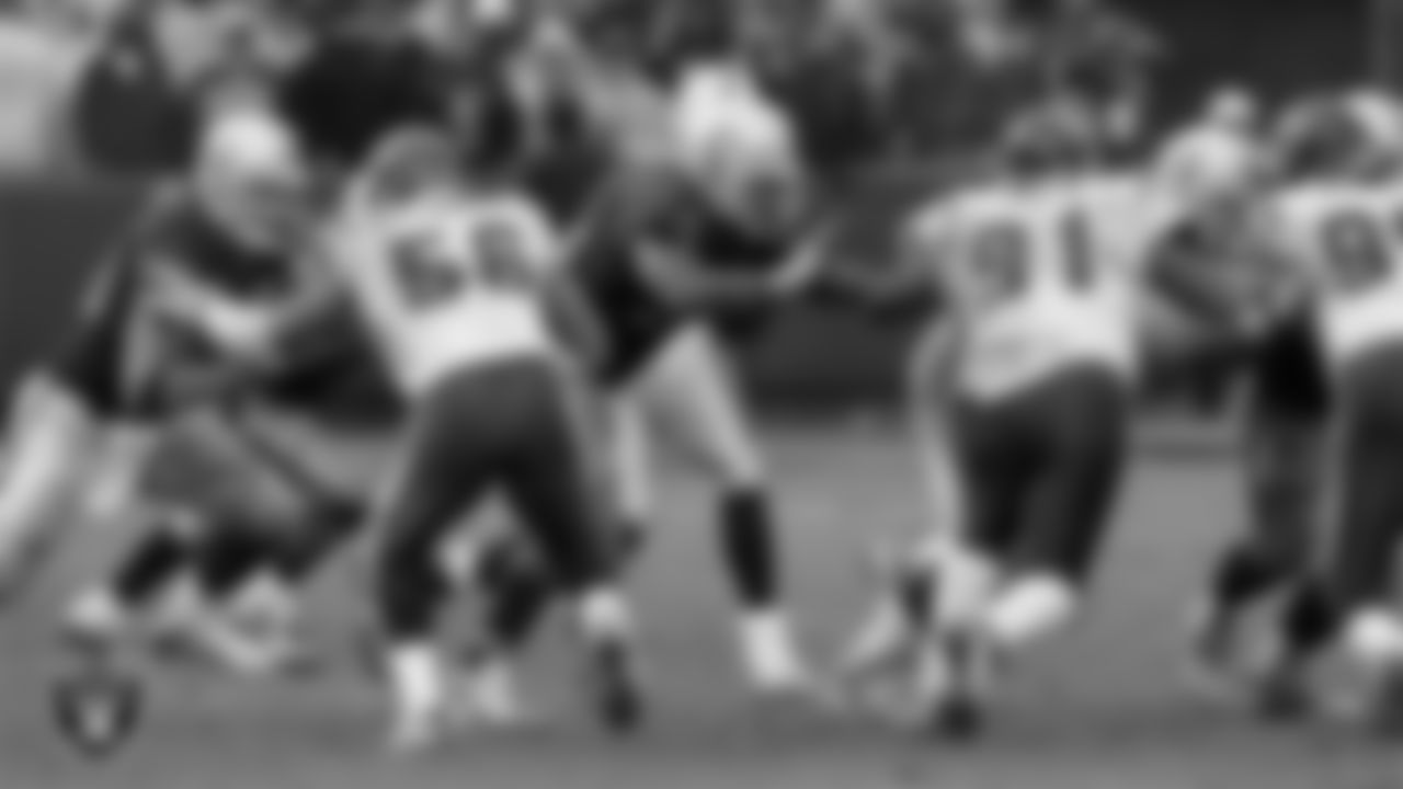 Oakland Raiders tight end Zach Miller (80) and tackle Cornell Green (74) during the regular season home game against the Houston Texans at Oakland-Alameda County Coliseum, Sunday, December 21, 2008, in Oakland, Calif.