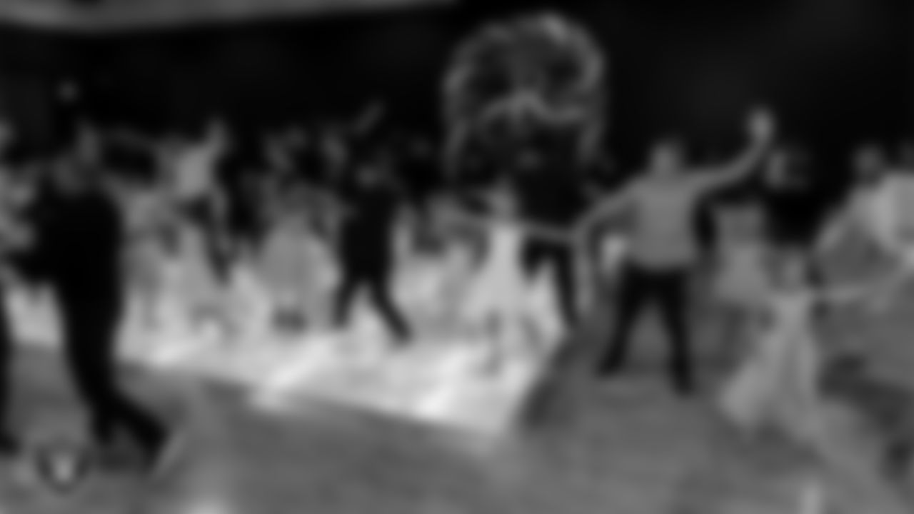 Attendees learn a dance during the Valentine's Day Dance at The Studio.