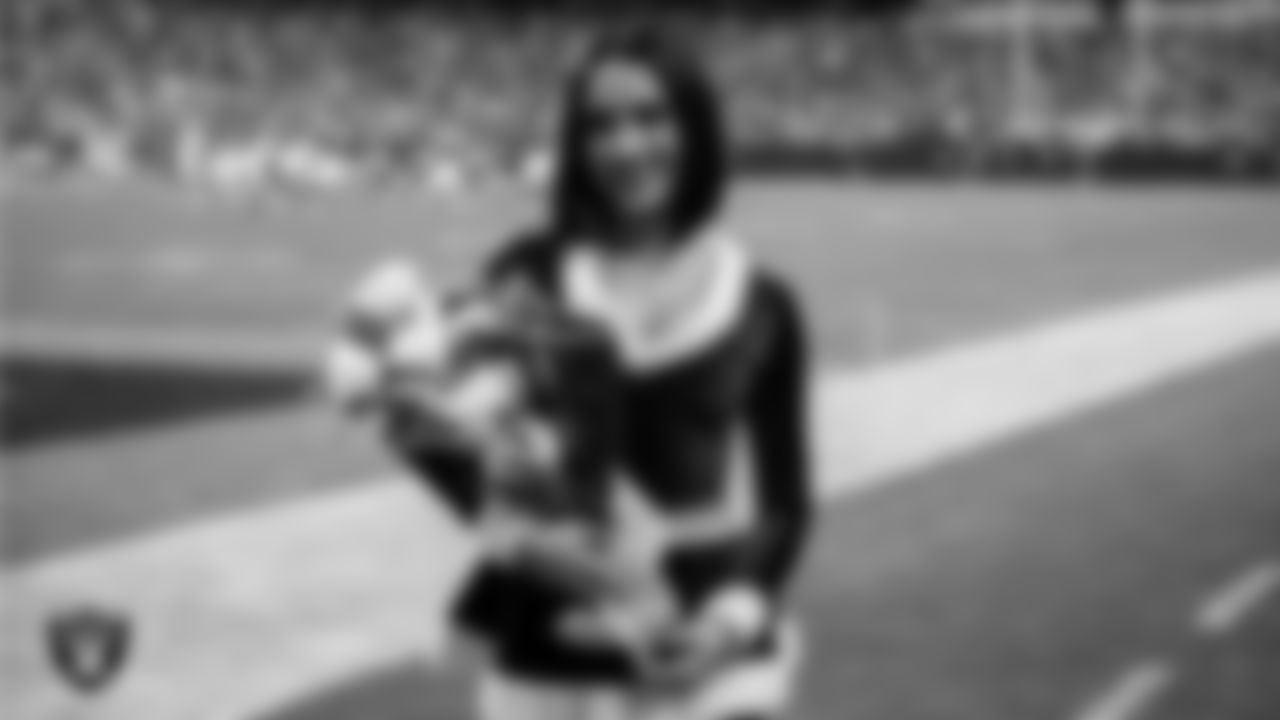 Raiderette Kylie poses for a photo after being named Dancer of the Year during the regular season home game against the New York Giants at Allegiant Stadium.