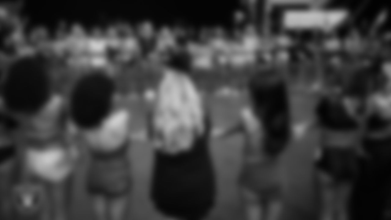 Finalists huddle before the final round of the 2025 Raiderettes Auditions at Allegiant Stadium.