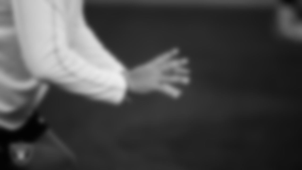 Las Vegas Raiders guard Caleb Rogers (76) warming up before the regular season away game against the Denver Broncos at Empower Field at Mile High.