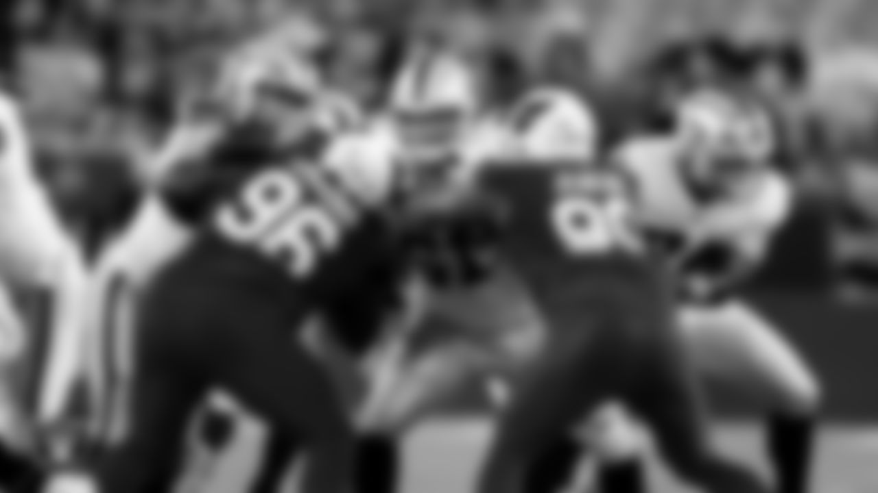 Las Vegas Raiders center Jackson Powers-Johnson (58), offensive lineman Jordan Meredith (61) and tackle Kolton Miller (74) during the preseason away game against the Arizona Cardinals at State Farm Stadium.