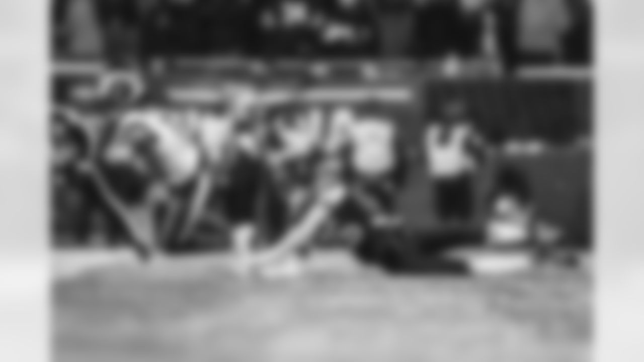 Los Angeles Rams wide receiver Davante Adams (17) attempts to make a catch under pressure by Chicago Bears defensive back Nahshon Wright (26) during an NFL football game on Sunday, January 18, 2026 in Chicago, Illinois. (Brooke Sutton/NFL)