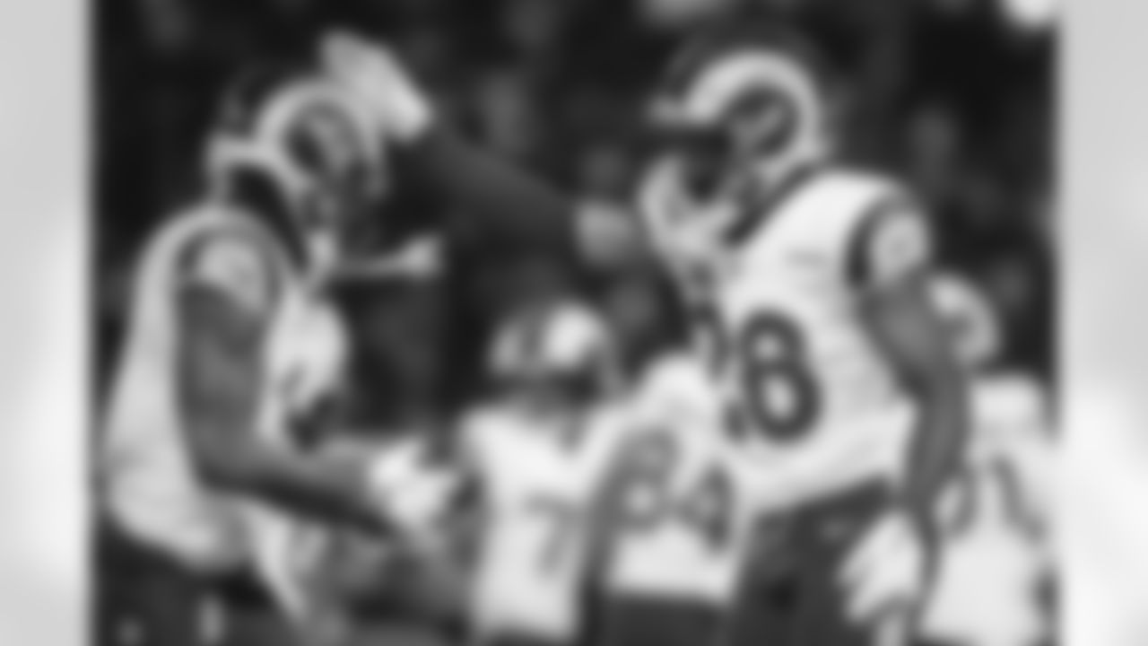 Los Angeles Rams safety Kam Curl (3) and safety Kamren Kinchens (26) celebrates after catching an interception during an NFL football game against the Chicago Bears on Sunday, January 18, 2026 in Chicago, Illinois. (Lauren Leigh Bacho/NFL)