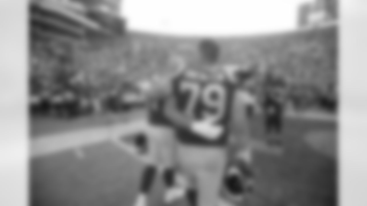 (77) Andrew Whitworth and (79) Rob Havenstein of the Los Angeles Rams walk off the field after the Rams 29-27 victory over the Packers in an NFL Week 8 regular season football game, Sunday, October 28, 2018, in Los Angeles, CA. (Jeff Lewis/Rams)
