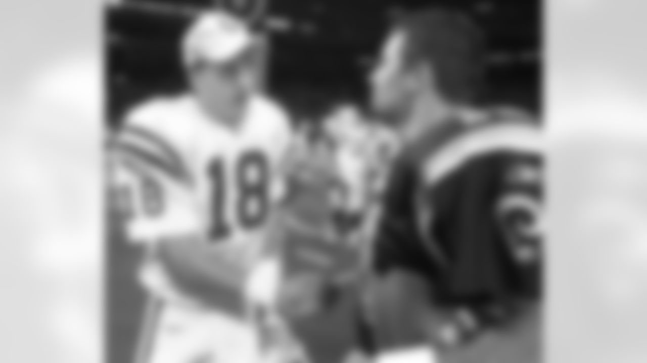 2025 Season Schedule: Week 4: Los Angeles Rams vs. Indianapolis Colts | Sunday, Sep. 28 @ 1:05 PM PT at SoFi Stadium
Throwback: Indianapolis Colts quarterback Peyton Manning, left, congratulates Rams quarterback Kurt Warner after Warner led his team to a 42-17 win and the NFC West title in St. Louis, Sunday, Dec. 30, 2001. (AP Photo/Charles Rex Arbogast)