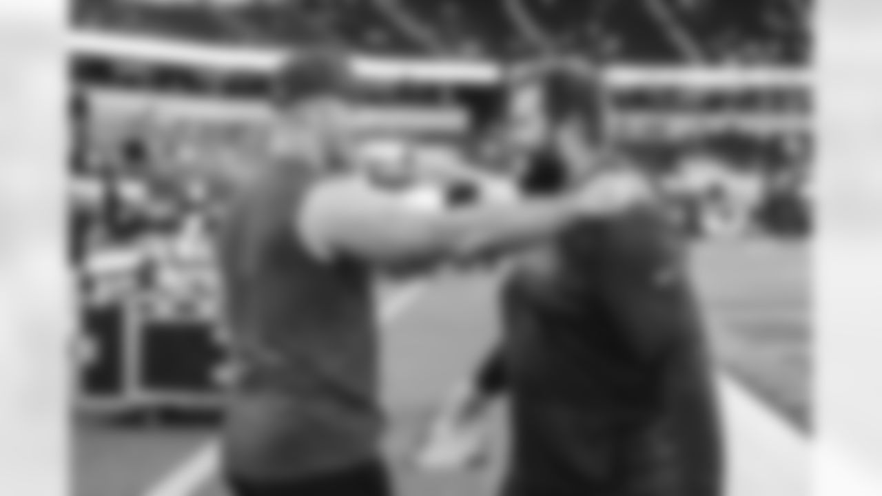 65 OL Coleman Shelton meets with Buccaneers DL Greg Gaines pregame ahead of the Rams vs. Buccaneers Week 12 matchup on Sunday Night Football