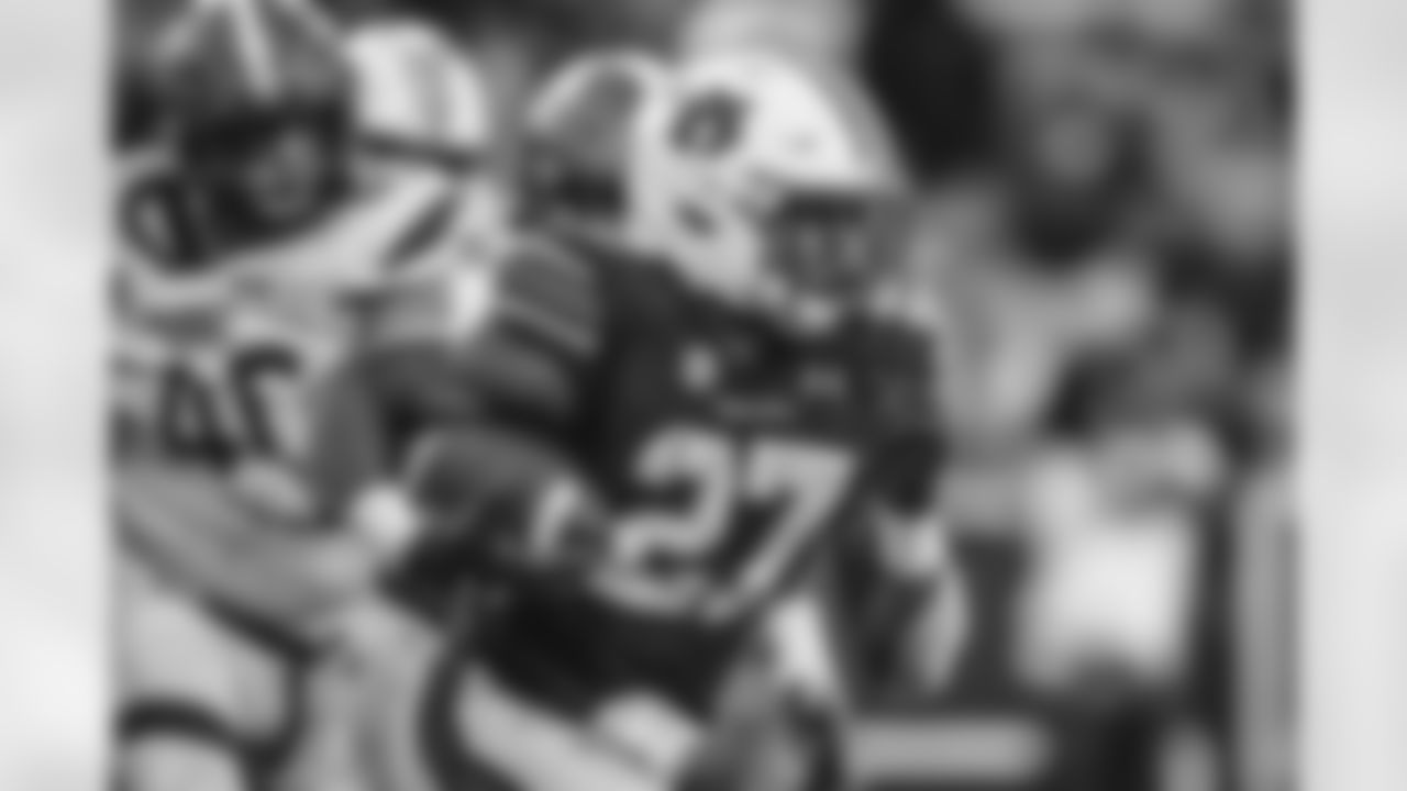 Auburn running back Jarquez Hunter (27) carries the ball against Georgia State during the second half of an NCAA football game Saturday, Sept. 25, 2021, in Auburn, Ala. (AP Photo/Butch Dill)