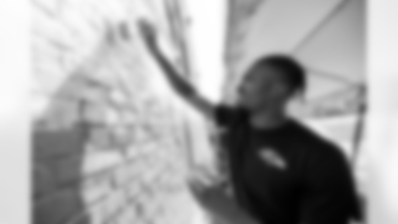 The Baltimore Ravens participate in their 2025 Signature Project.
