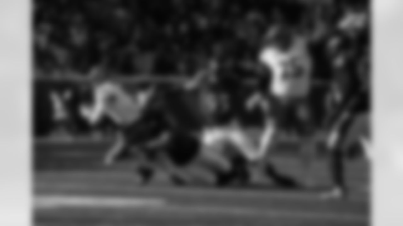 DE Dre'Mont Jones (left) & OLB Tavius Robinson (right)