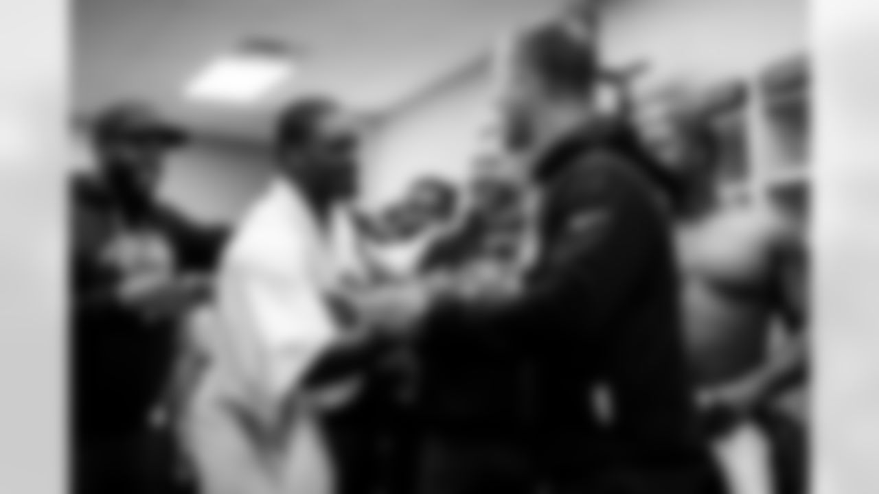 S Malaki Starks (left) & Head Coach John Harbaugh (right)