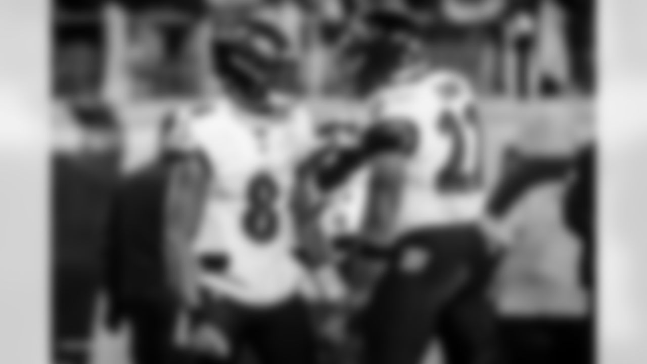 QB Lamar Jackson (left) & RB Derrick Henry (right)