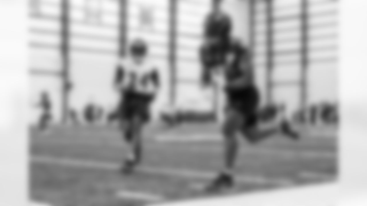 S Malaki Starks (left) & RB Justice Hill (right)