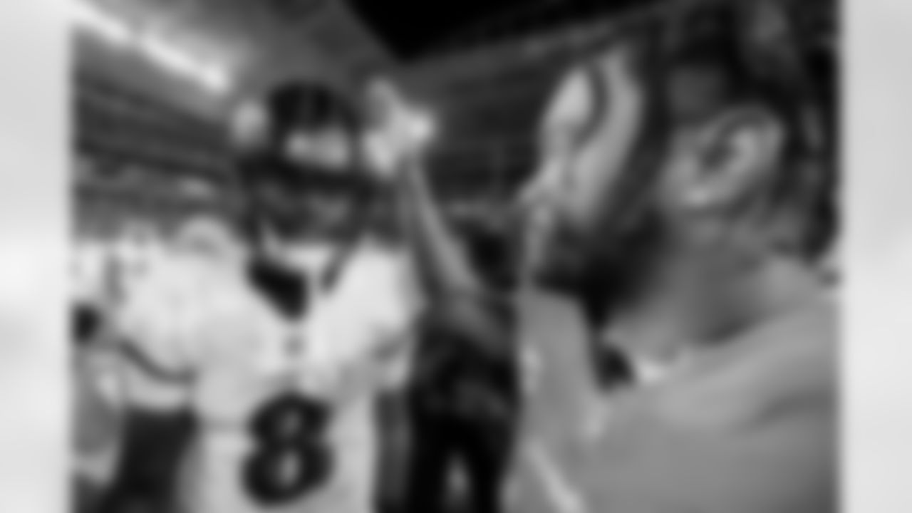 QB Lamar Jackson (left) & Dolphins QB Tua Tagovailoa (right)