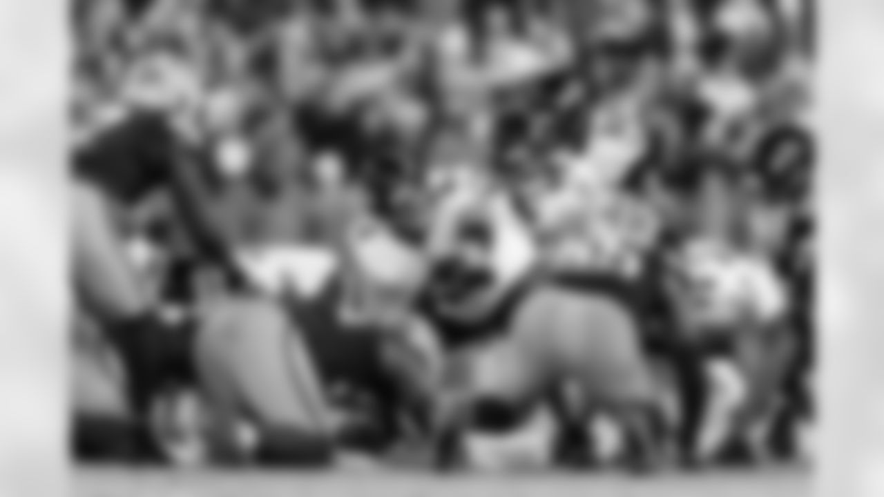 C Tyler Linderbaum (left), TE Mark Andrews (middle), & RB Derrick Henry (right)