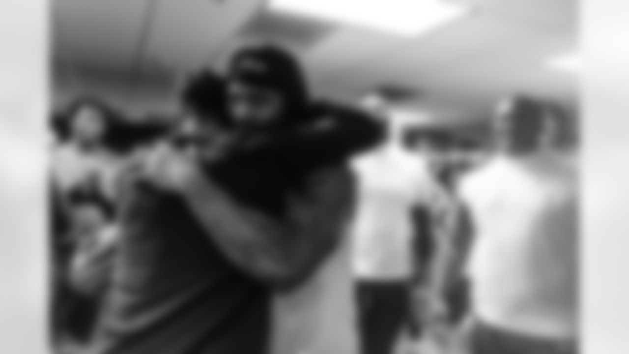 Head Coach John Harbaugh (left) & OLB Mike Green (right)