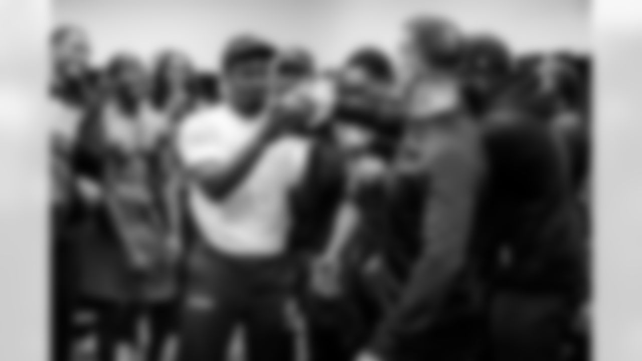 CB Chidobe Awuzie (left) & Head Coach John Harbaugh (right)