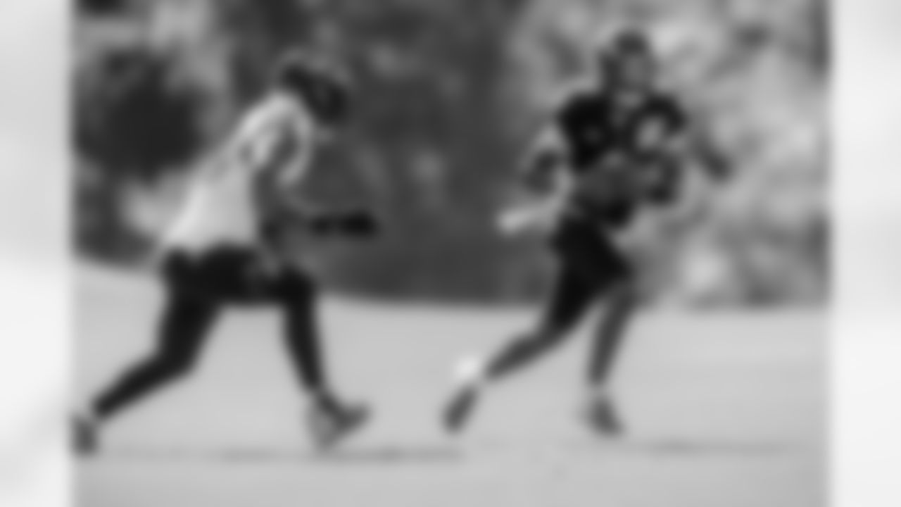OLB Odafe Oweh (left) & QB Lamar Jackson (right)