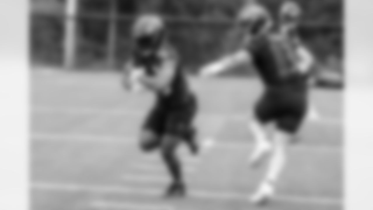 RB Justice Hill (left) & QB Devin Leary (right)