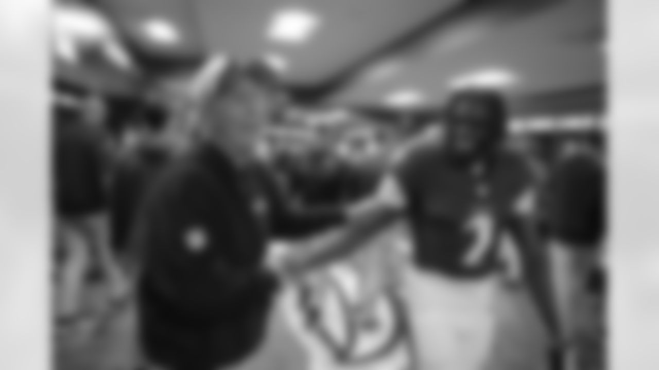 The Ravens' celebrated in the locker room following a 37-3 victory over the Seattle Seahawks.