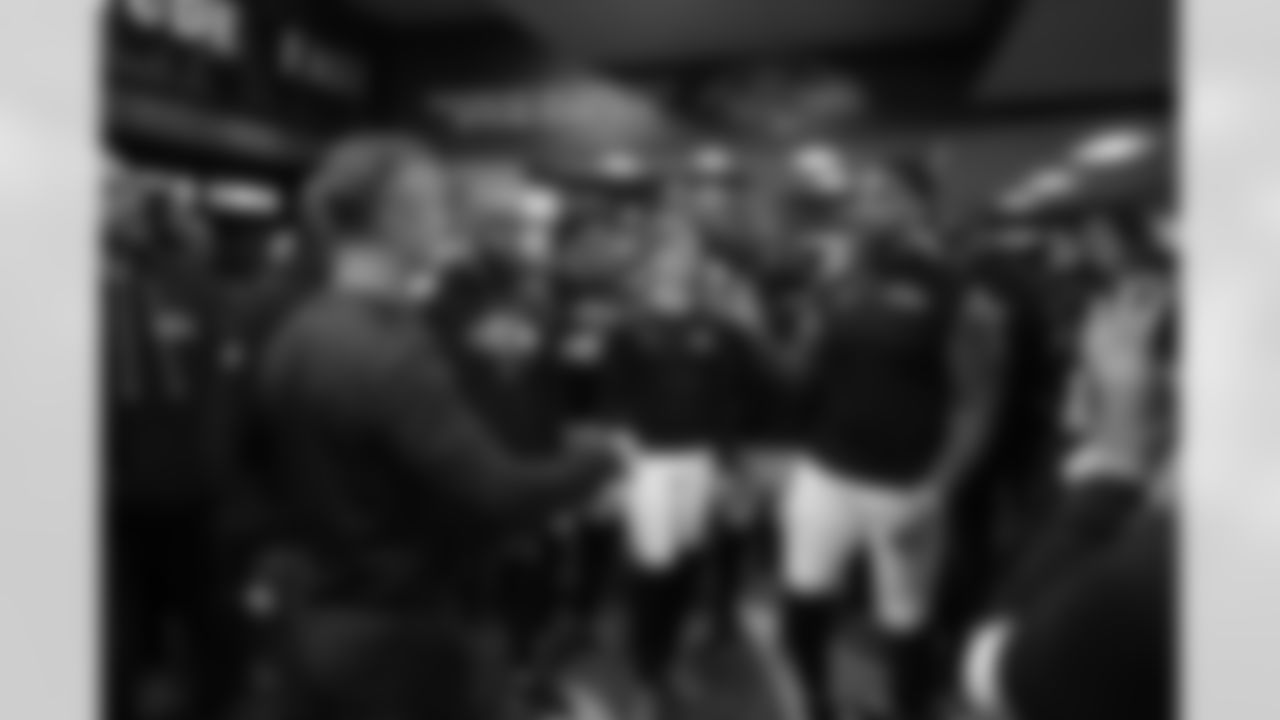 (left) Head Coach John Harbaugh & (right) DE Dre'Mont Jones