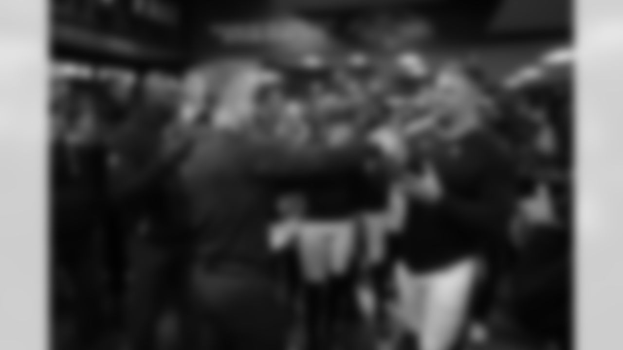 (left) Head Coach John Harbaugh & (right) LS Nick Moore