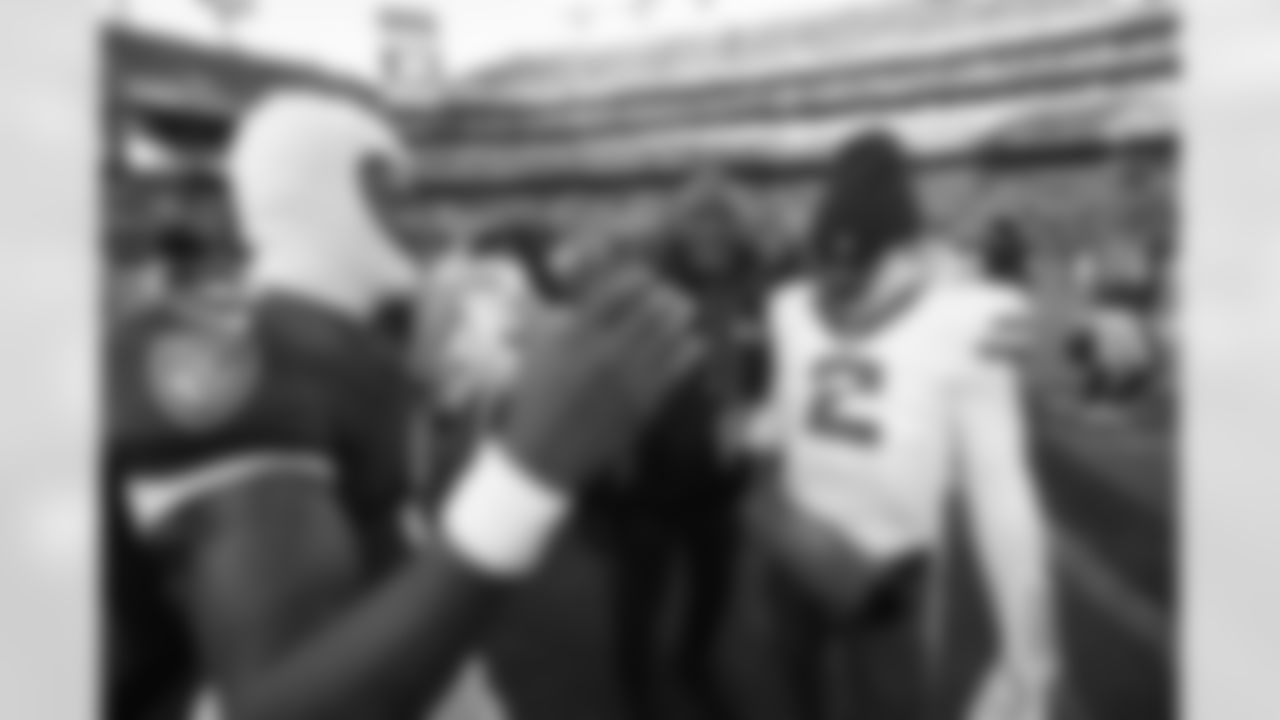 (left) QB Lamar Jackson & (right) QB Tyrod Taylor