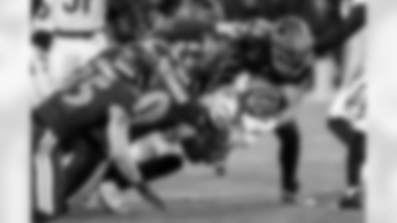 From left: LB Jake Hummel, ILB Teddye Buchanan, & TE Charlie Kolar