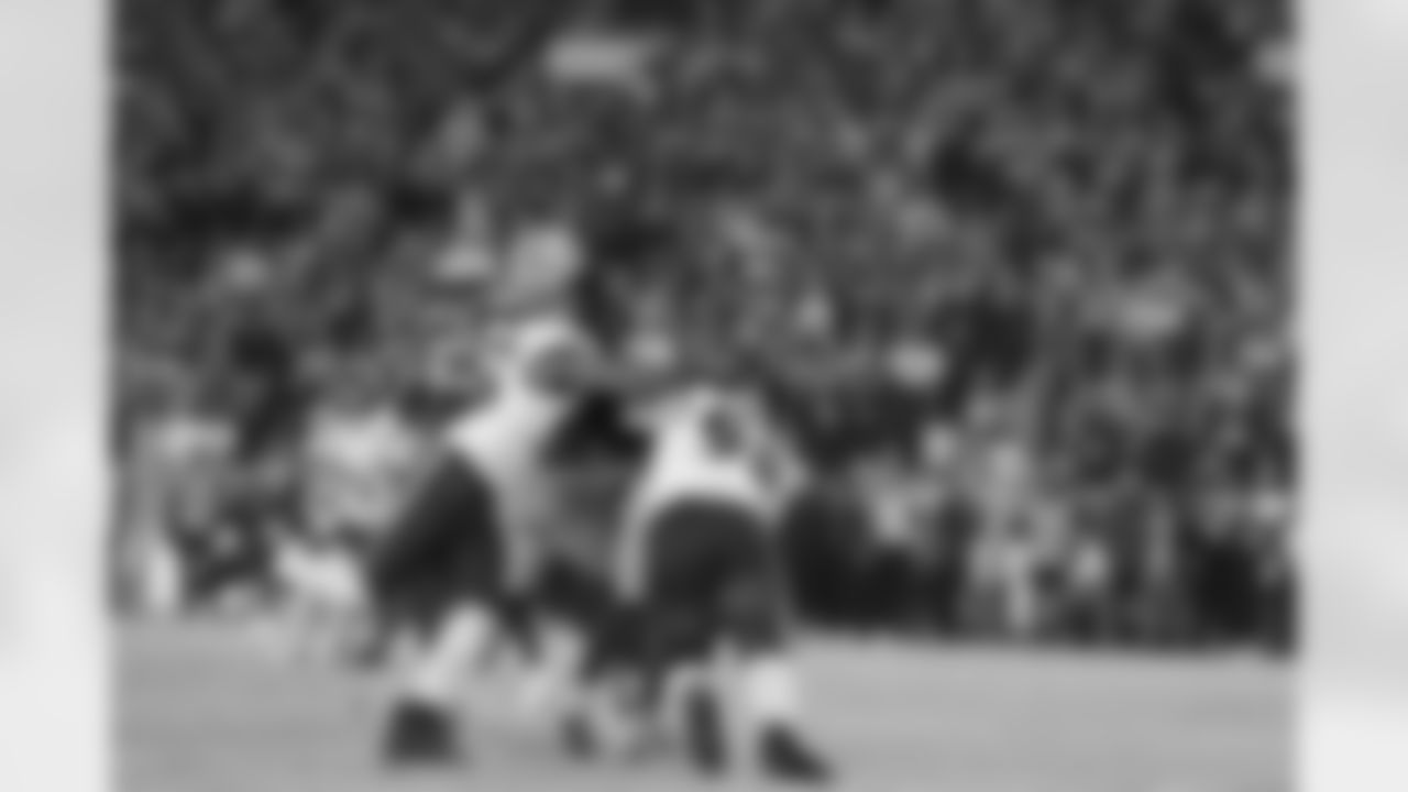 OLB Mike Green (left) & DT Travis Jones (right)