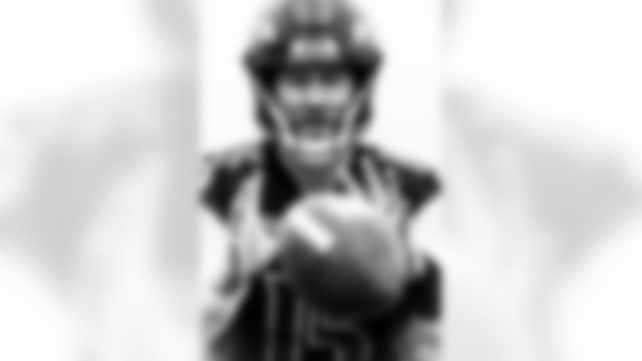 QB Cooper Rush