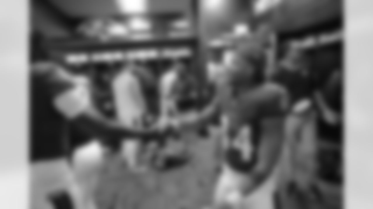 The Ravens' celebrated in the locker room following a 37-3 victory over the Seattle Seahawks.