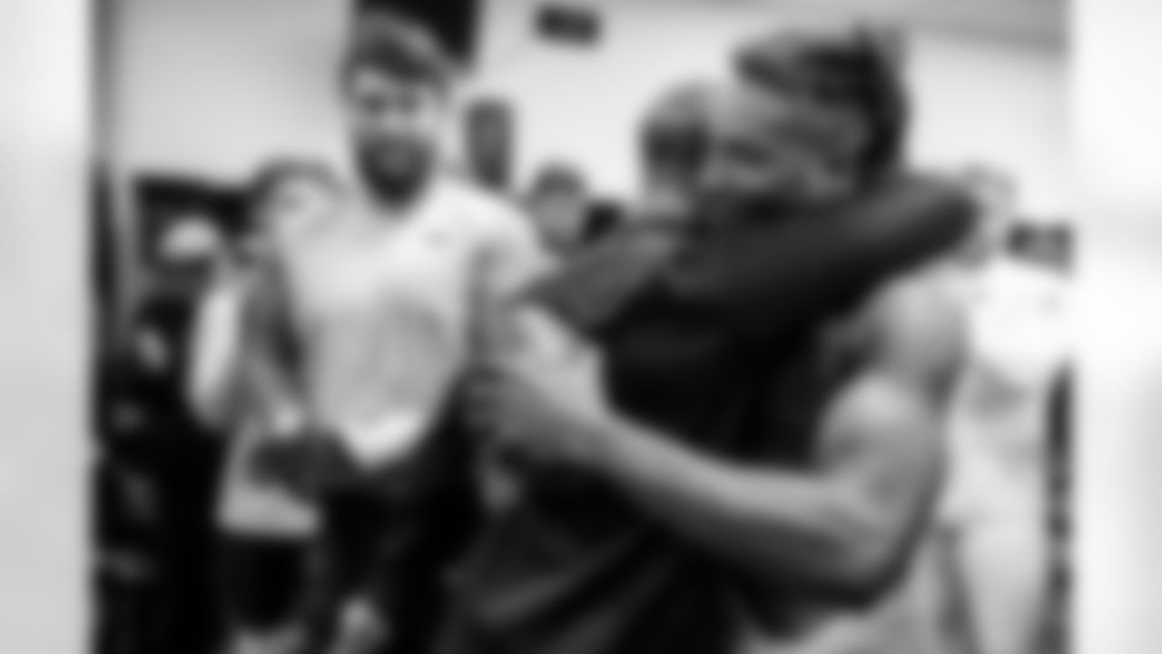 Head Coach John Harbaugh (left) & WR DeAndre Hopkins (right)