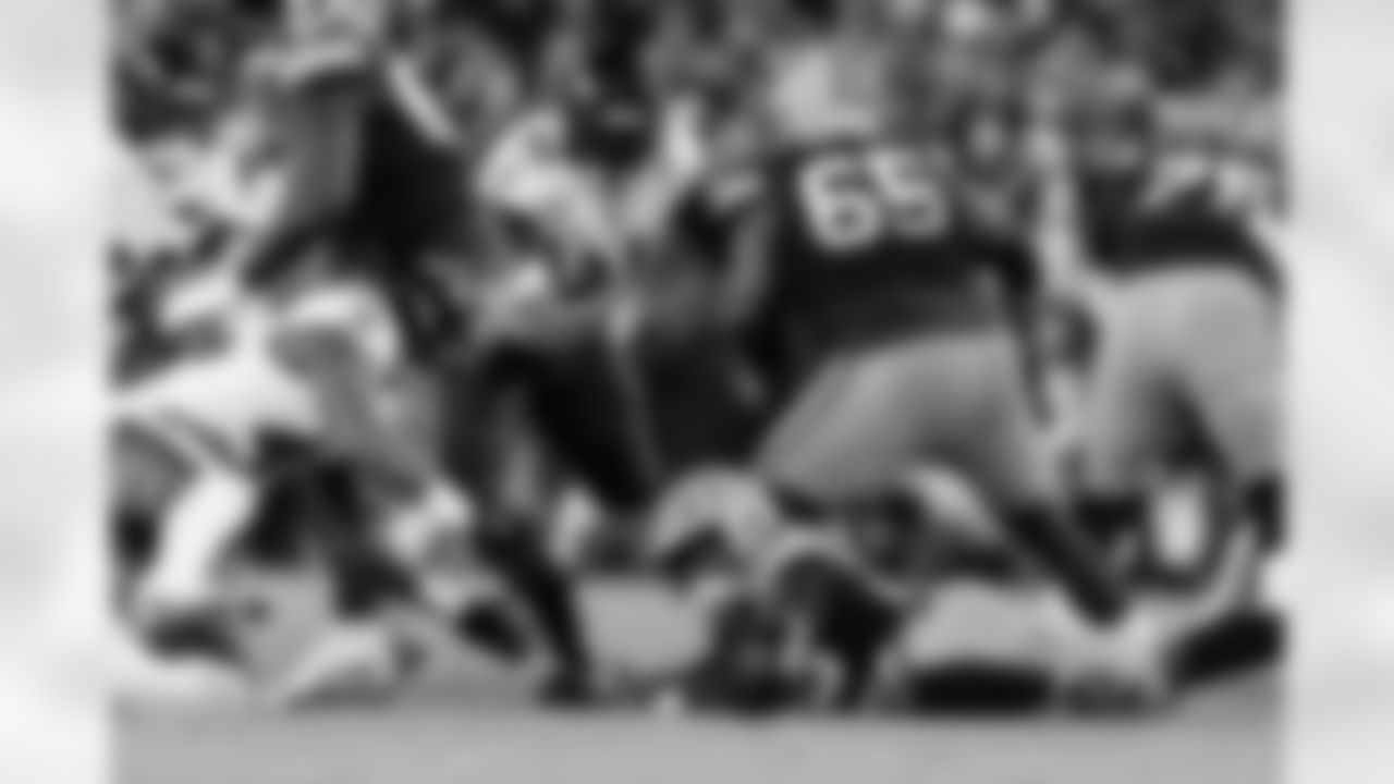 OLB Mike Green (left) & DT C.J. Okoye (right)