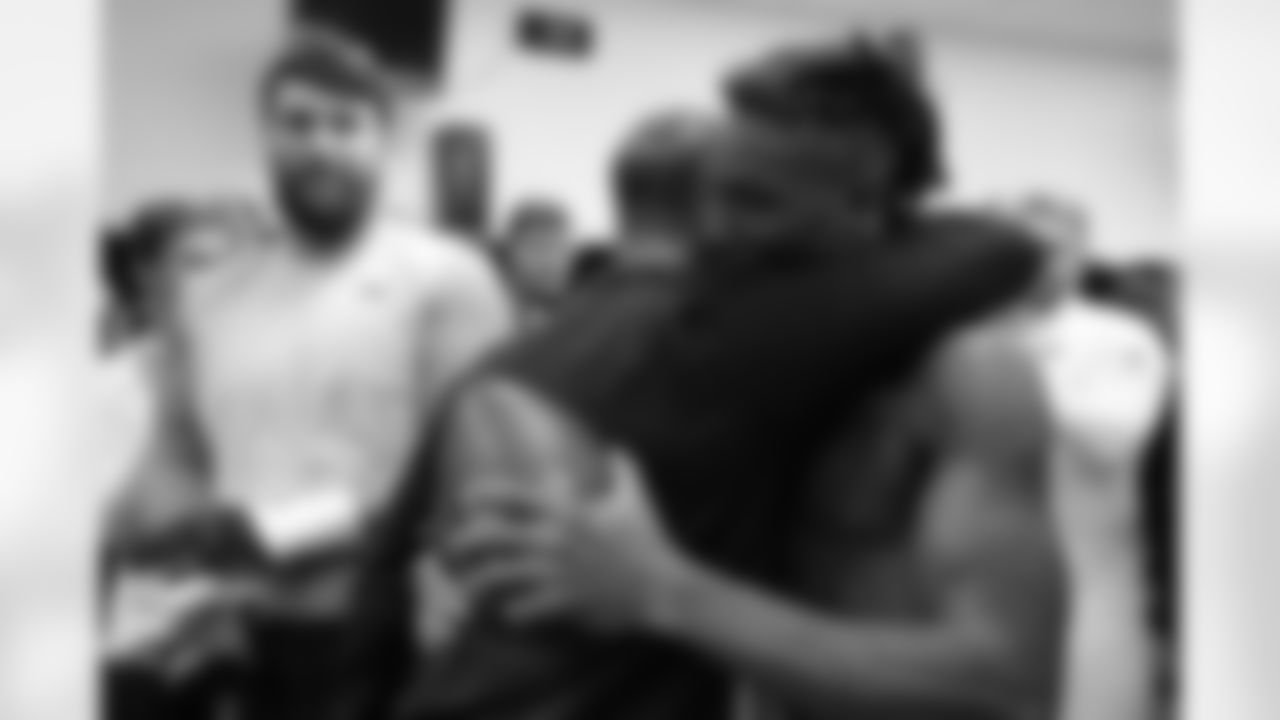 Head Coach John Harbaugh (left) & WR DeAndre Hopkins (right)