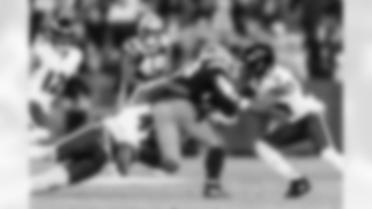 LB Jay Higgins IV (left) & S Ar'Darius Washington (right)