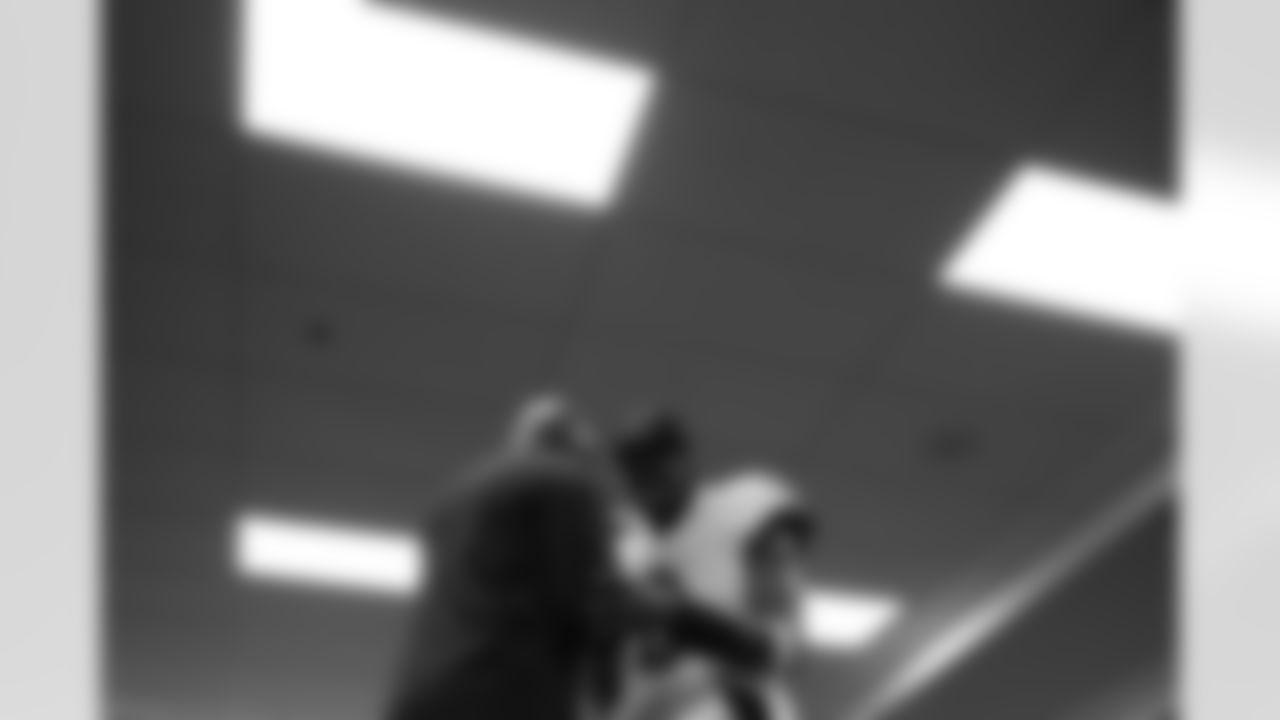 Ozzie Newsome (left) & QB Lamar Jackson (right)