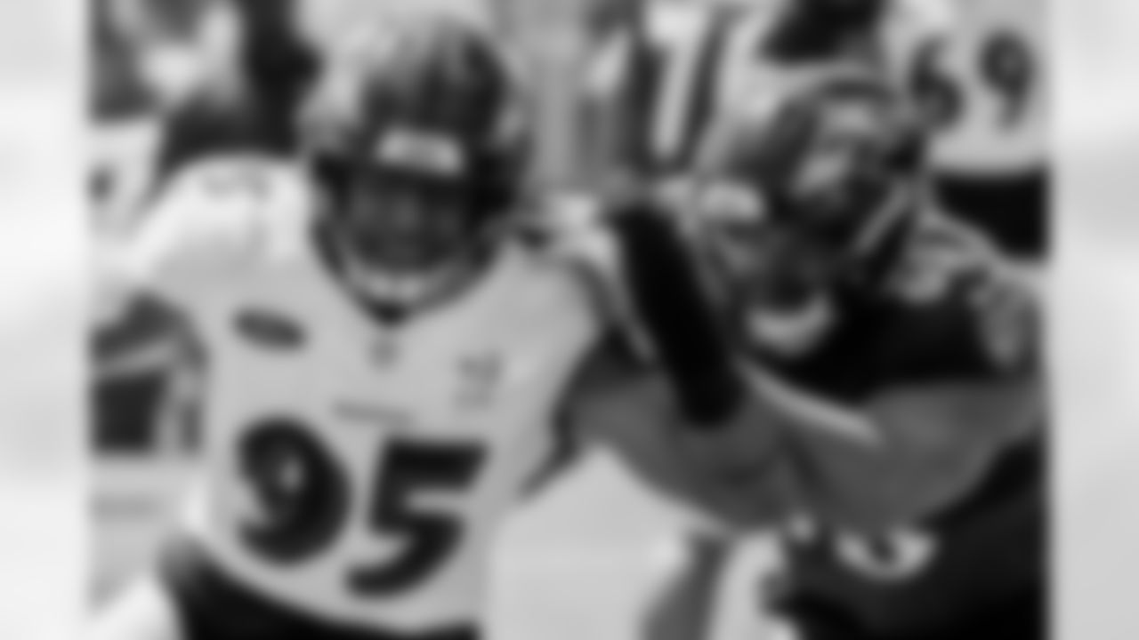 OLB Tavius Robinson (left) & T Joseph Noteboom (right)