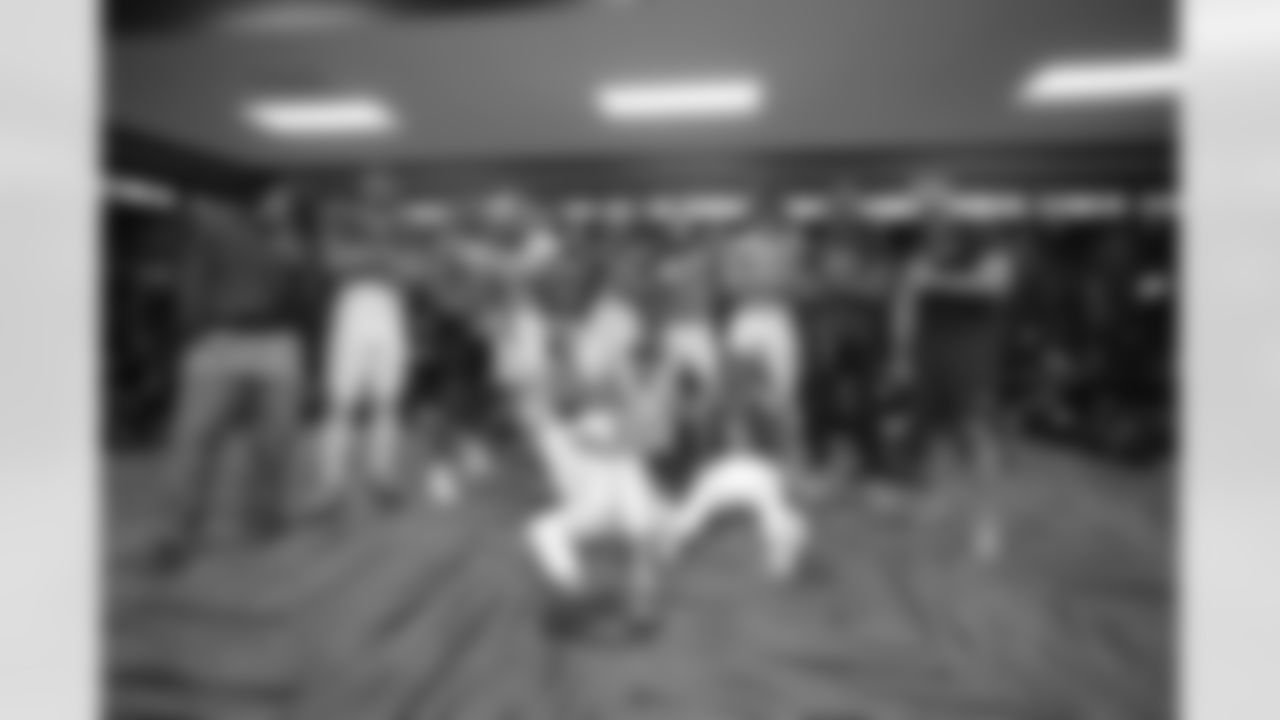 The Ravens' celebrated in the locker room following a 37-3 victory over the Seattle Seahawks.