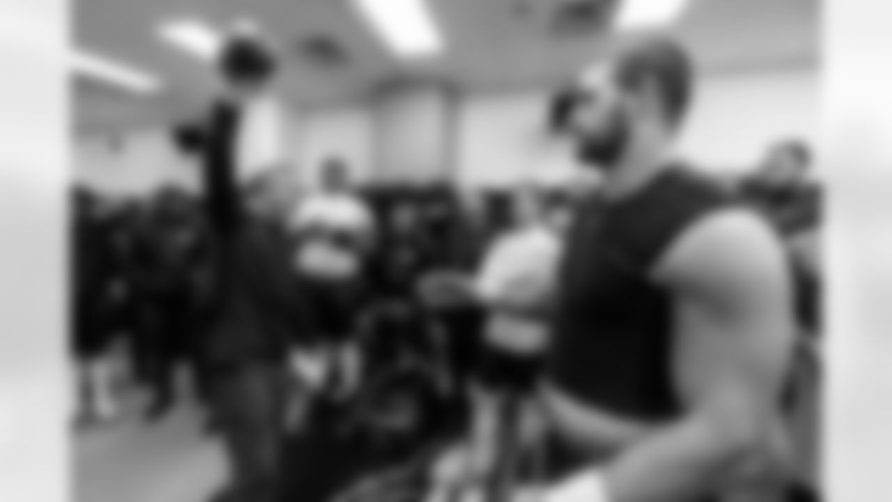 Head Coach John Harbaugh (left) & TE Mark Andrews (right)