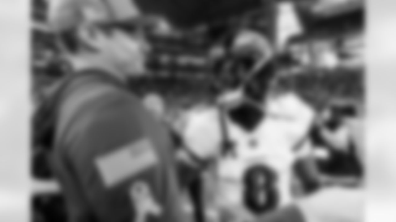 Vikings Head Coach Kevin O'Connell (left) & QB Lamar Jackson (right)