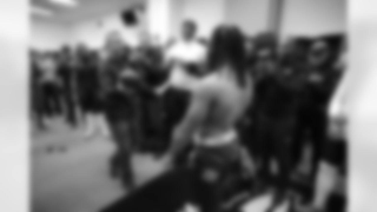 Head Coach John Harbaugh (left) & RB Keaton Mitchell (right)