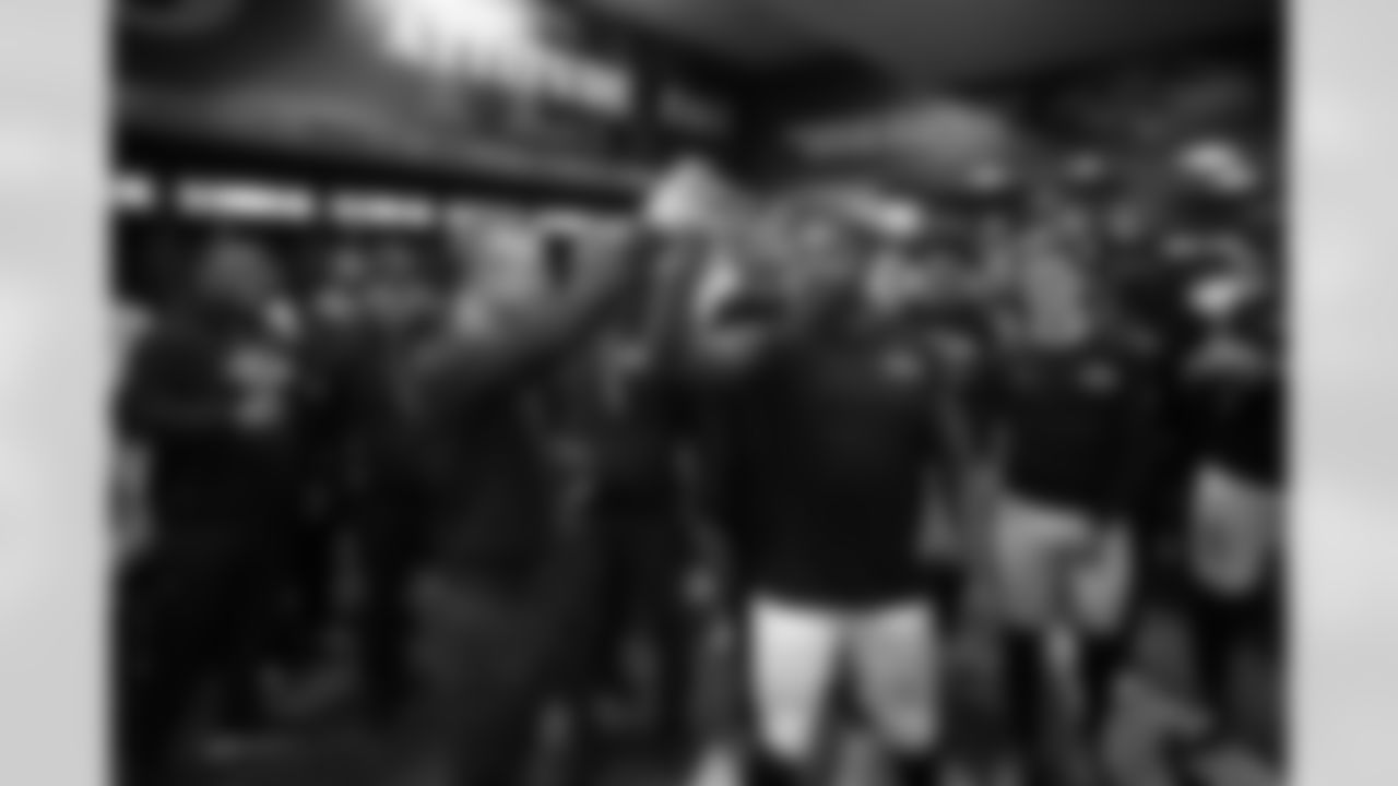 (left) Head Coach John Harbaugh & (right) ILB Roquan Smith