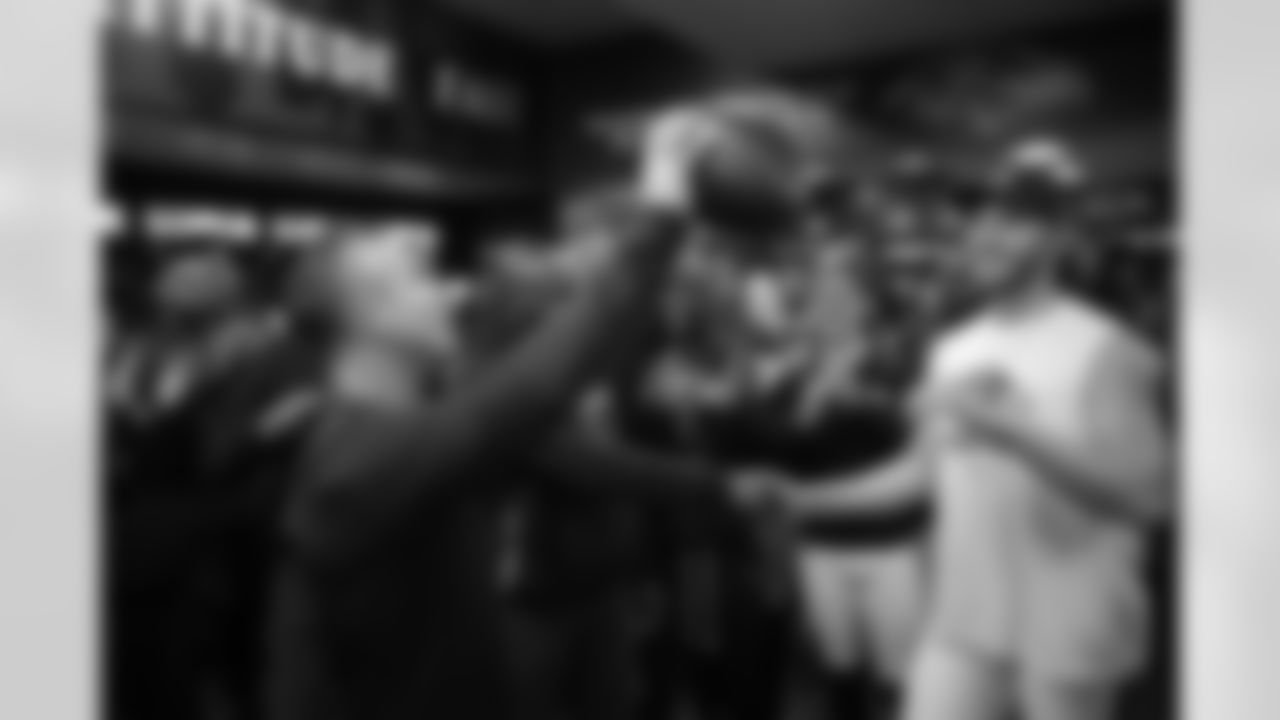 (left) Head Coach John Harbaugh & (right) P Jordan Stout