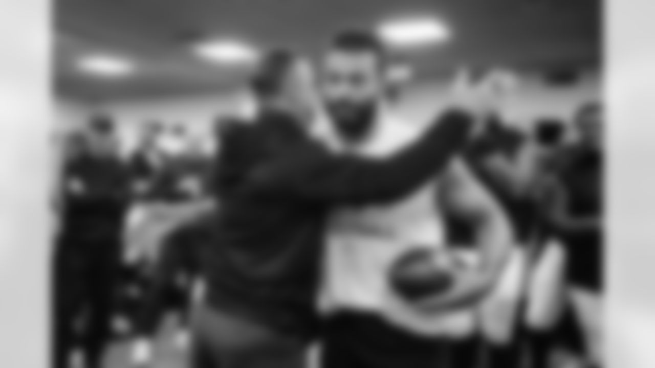 Head Coach John Harbaugh (left) & OLB Kyle Van Noy (right)